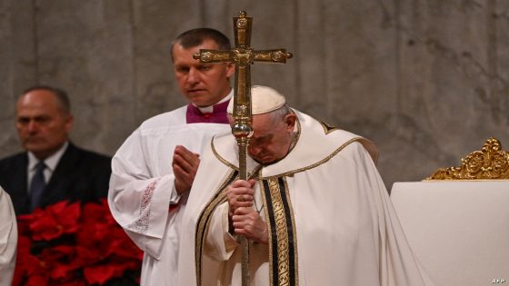 Pope Francis attends the Christmas Eve mass at The St Peter's Basilica in the Vatican on December 24, 2022. (Photo by Andreas SOLARO / AFP)